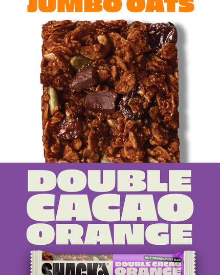 Double Cacao Orange gut-friendly oat bar. Close-up shows rich cacao pieces, zesty orange, and jumbo oats, emphasising natural ingredients for a high fibre, deliciously chewy snack