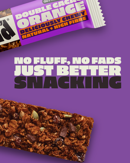 SNACK'd Double Cacao Orange gut-friendly oat bar 16-pack. The packaging display shows the vegan, high fibre oat bars, ideal for a natural and tasty snack